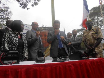 French Minister of Foreign Trade, Promotion of Tourism and French Nationals abroad, Mr. Matthias Fekl, makes the first radio call to kick start the new digital radio network. Looking on are; extreme left Cabinet Secretary Prof. Judi Wakhungu 